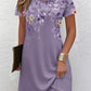 Relaxed floral print short sleeve dress showing the straight easy body and print
