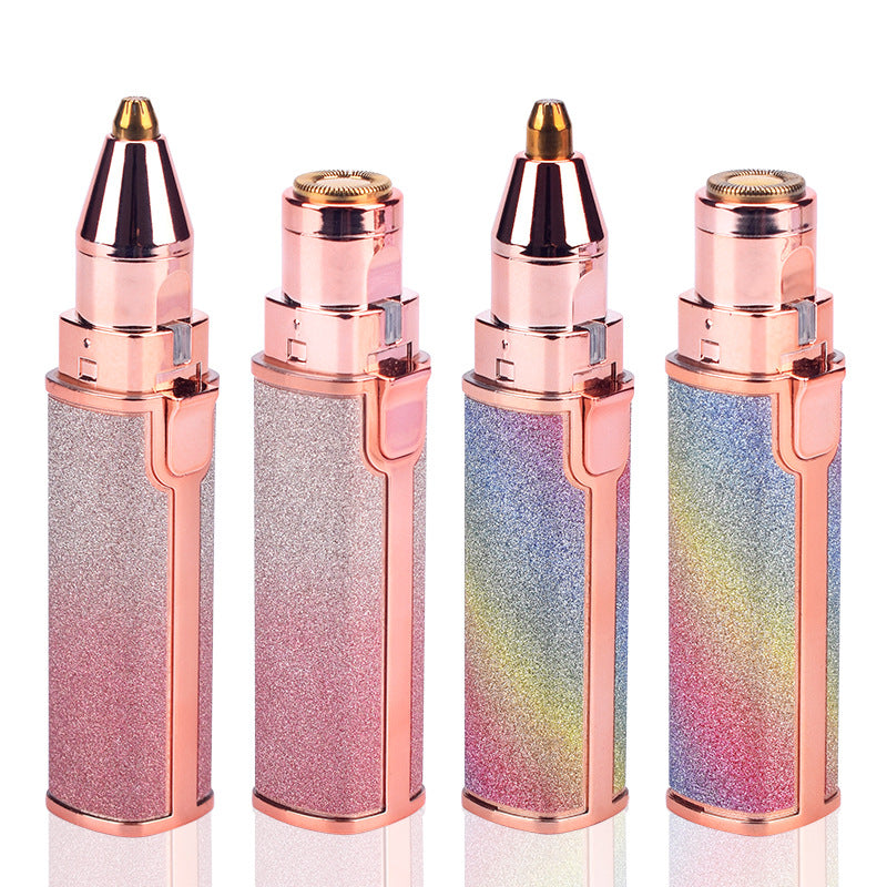 Four lipstick shaped ladies shavers in gradient rainbow and pink finishes