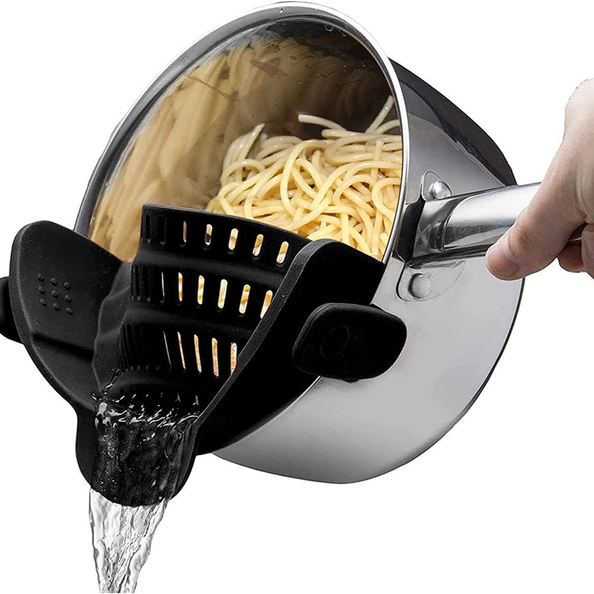 Black silicone clip-on pot strainer on a stainless steel pot draining spaghetti, water pouring from the spout