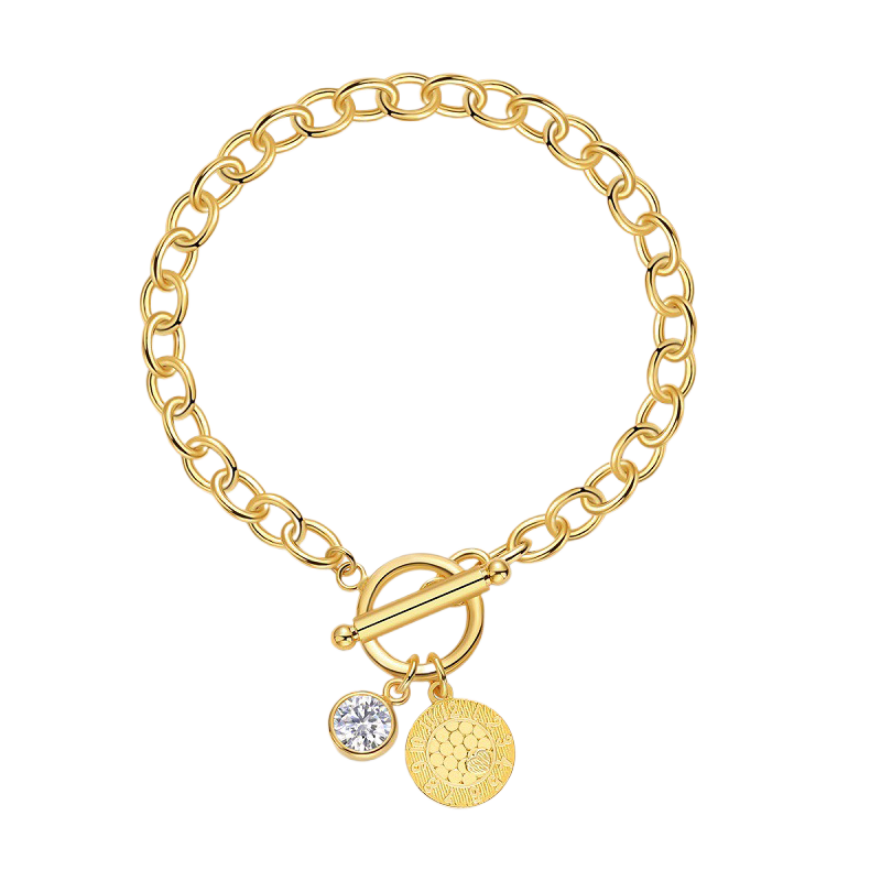 Front view of the stainless steel Cuban chain bracelet flat on a stone