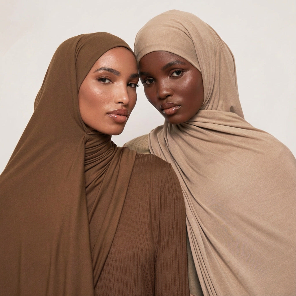 Modal cotton headscarf wrap with a narrow rolled hem running along the finished rectangular edge