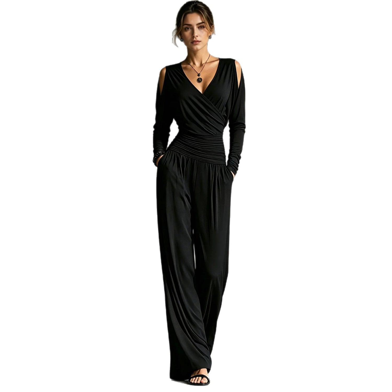 Side seam pocket detail at the hip of the wide-leg jumpsuit