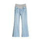Light blue flared maternity jeans with a gray stretch knit belly panel on a white background