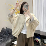 Womens casual button front short jacket in black, full jacket view
