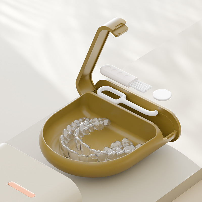 Compact plastic retainer storage case shown from the side in a soft color