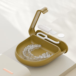 Compact plastic retainer storage case shown from the side in a soft color