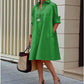 Green polyester shirt collar long sleeve A-line midi dress on a standing model