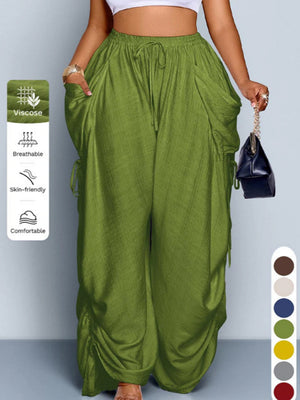 High waist wide leg linen look viscose drawstring trousers, close up of the high drawstring waist