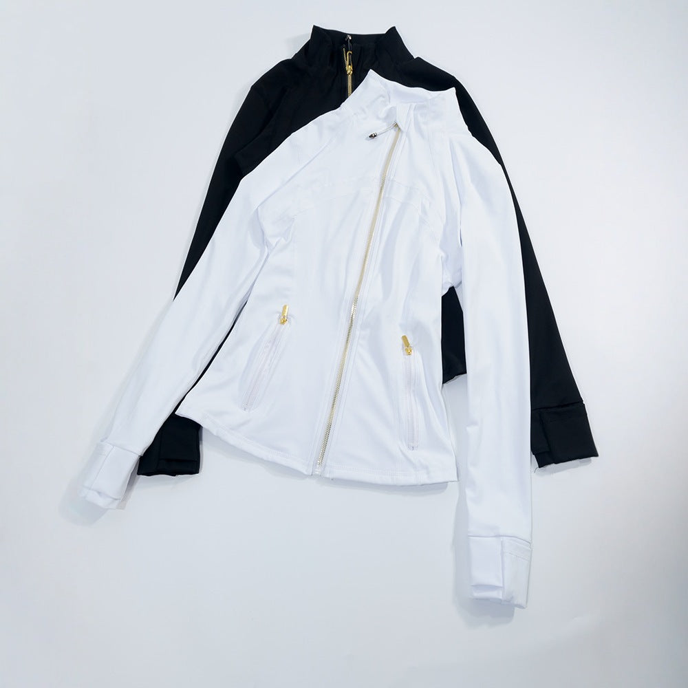 Model walking after a morning run, jacket cracked open at the throat