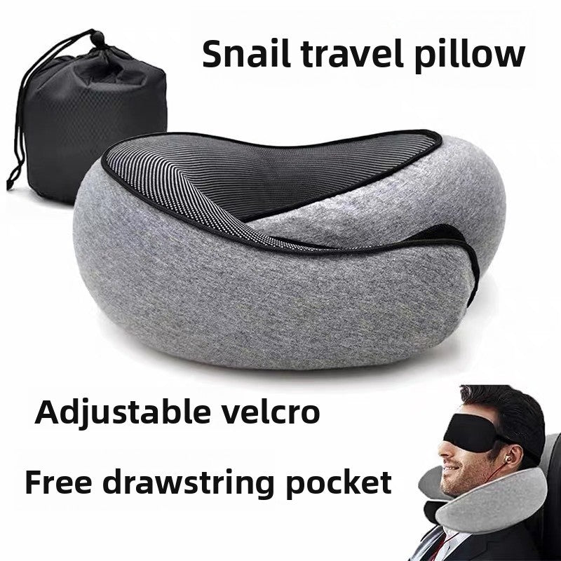 Grey snail travel pillow with black mesh inner face beside its black drawstring storage bag