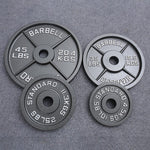 Cast iron barbell plate front view with weight value cast into the matte black face