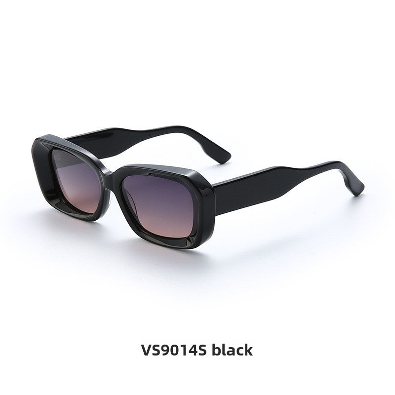 Black retro square frame sunglasses with purple gradient lenses at a three quarter angle