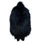Plush fur travel backpack held by hand showing size and scale