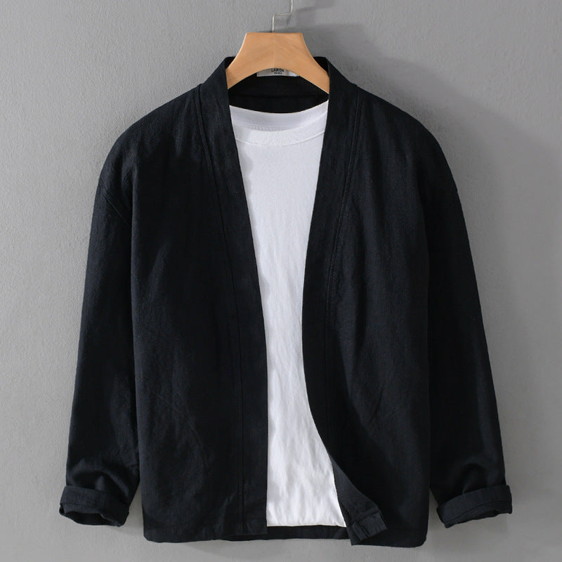 Close view of the narrow stand collar and open front edges of the ramie jacket