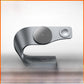 Dark gray C-shaped 3-in-1 wireless charger with a round magnetic phone pad and a smaller watch pad, front view