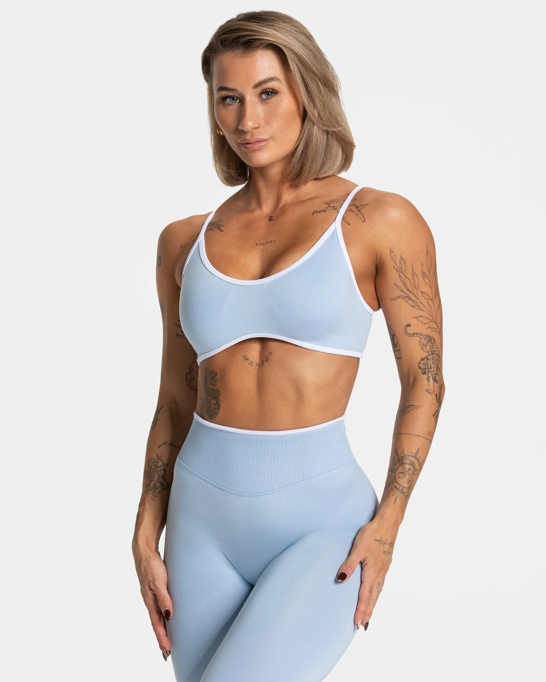 Seamless yoga set with scoop bralette and high-waisted leggings, side view