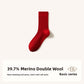 Merino wool blend mid calf socks in a solid color, folded pair on a plain background