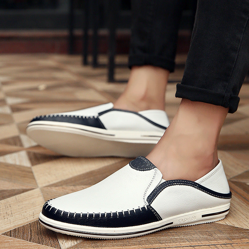 Mens leather loafer with tan leather lining, round toe and hand look car stitch detail