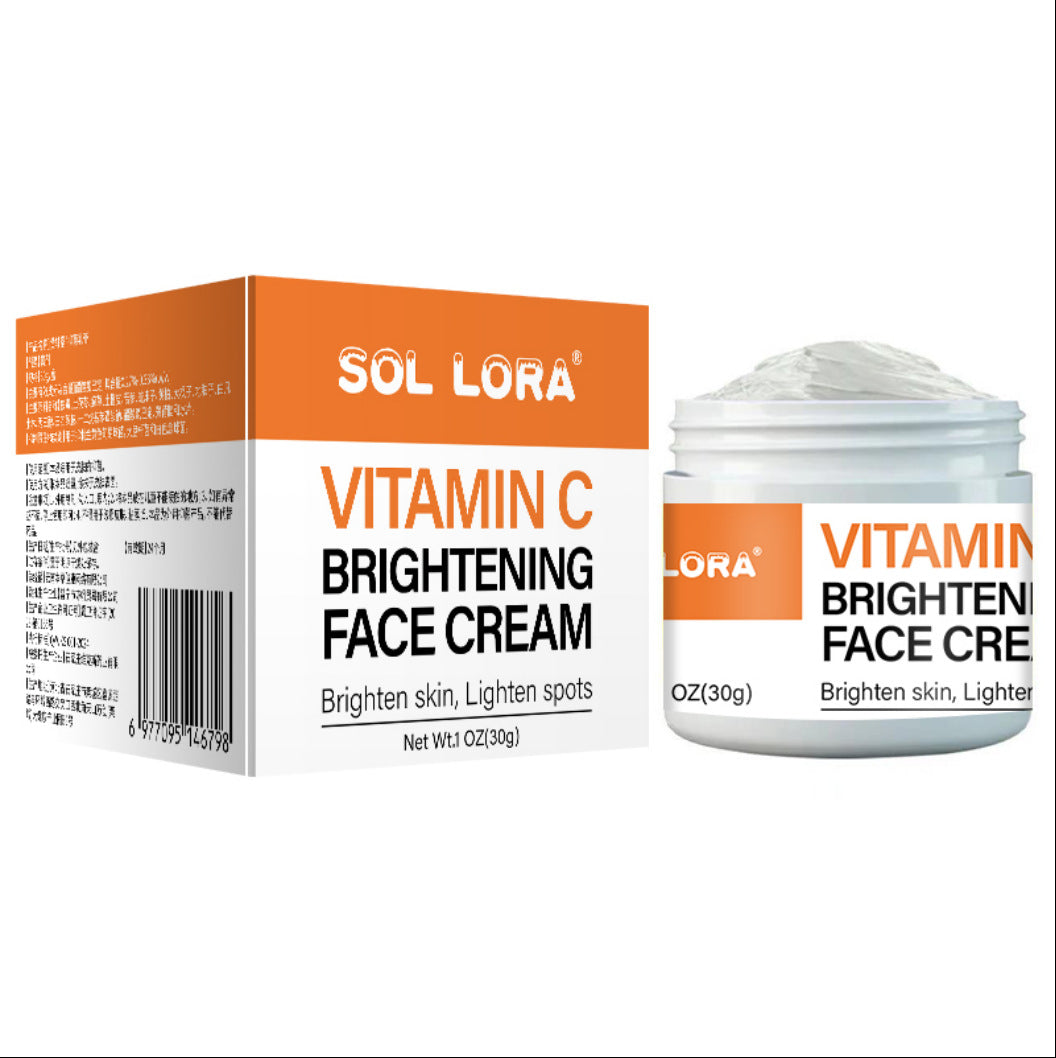 White Vitamin C face cream jar and matching carton, 30 gram size, on a plain background