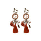 Boho vintage clip-on drop earrings with fringe and bead accents, zinc alloy build, studio image on white background