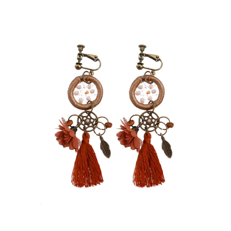 Boho vintage clip-on drop earrings with fringe and bead accents, zinc alloy build, studio image on white background