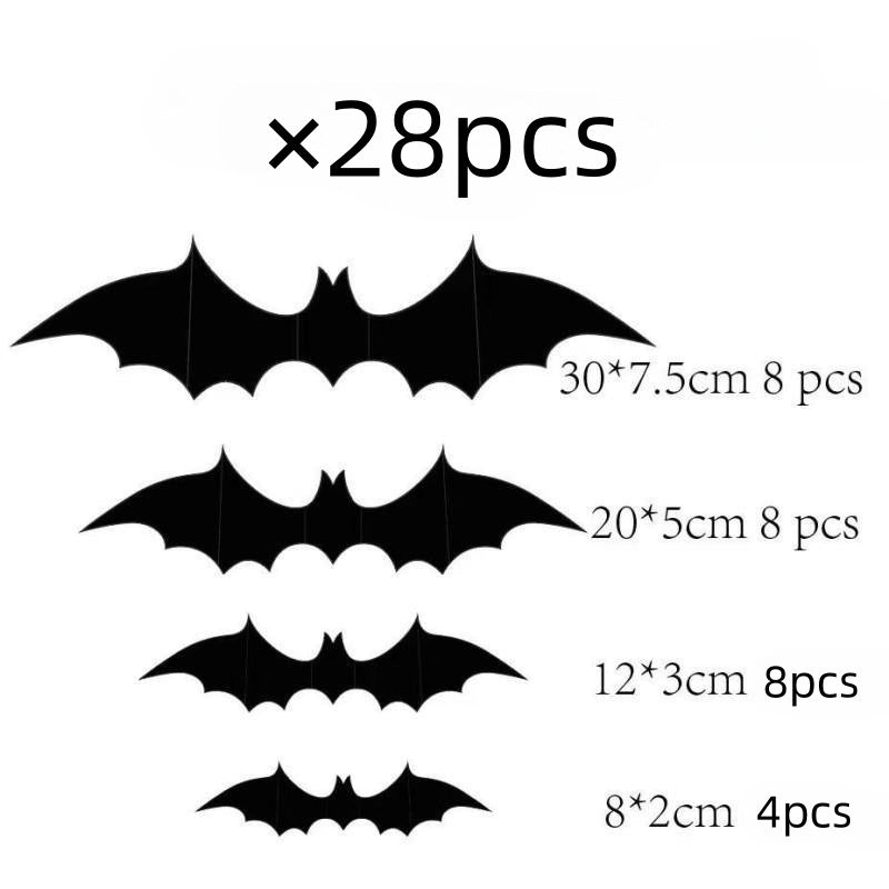 Black bat wall stickers arranged in flight across a pale wall