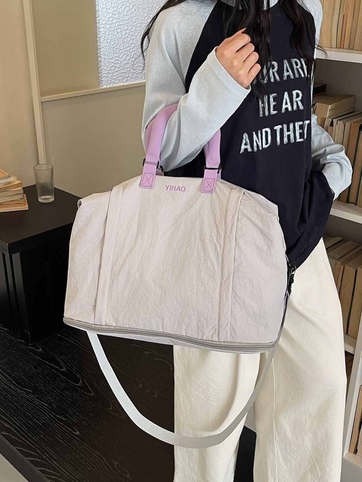 Oxford travel duffel with the base expansion zip opened for extra capacity