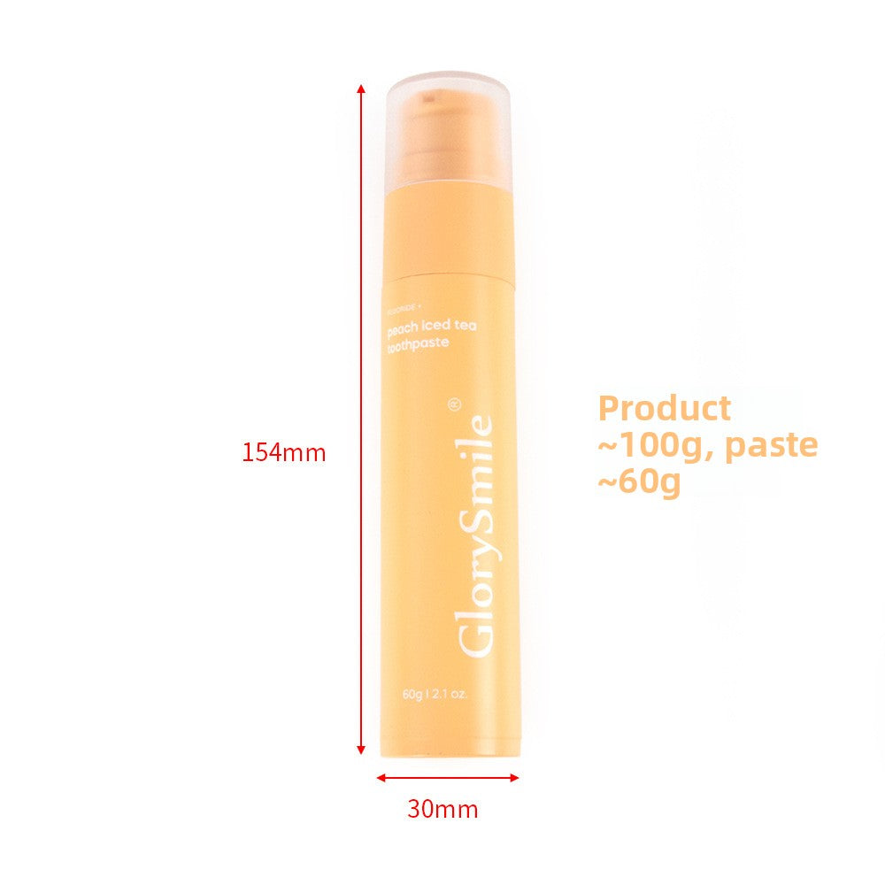 GlorySmile fruity fluoride toothpaste tube in a bright color on a plain background