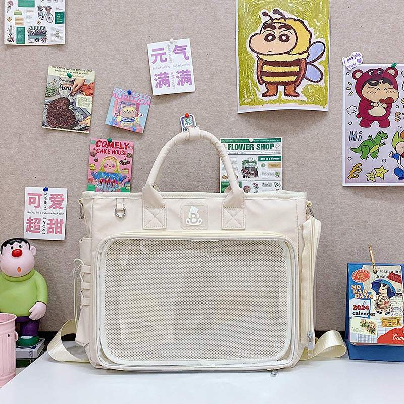 Interior of the roomy nylon shoulder bag with a phone pocket and zip compartment