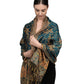 Dark teal paisley tassel shawl wrap worn draped over the shoulders with tasseled fringe ends