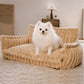 Sofa style plush pet bed with a raised bolster on three sides and a loose cushion, for cats and dogs