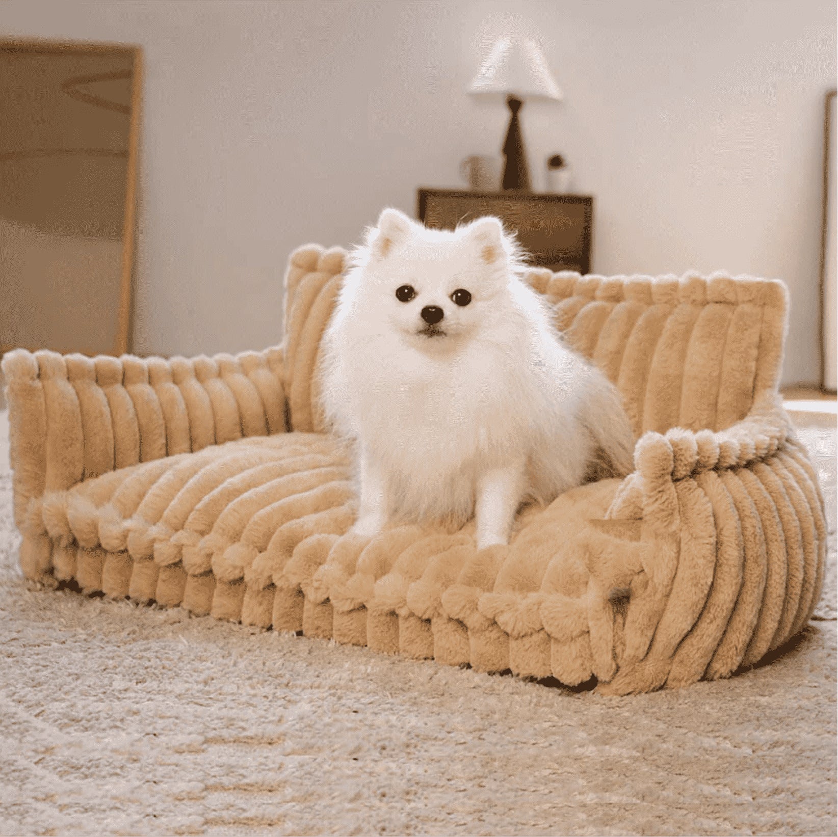 Sofa style plush pet bed with a raised bolster on three sides and a loose cushion, for cats and dogs