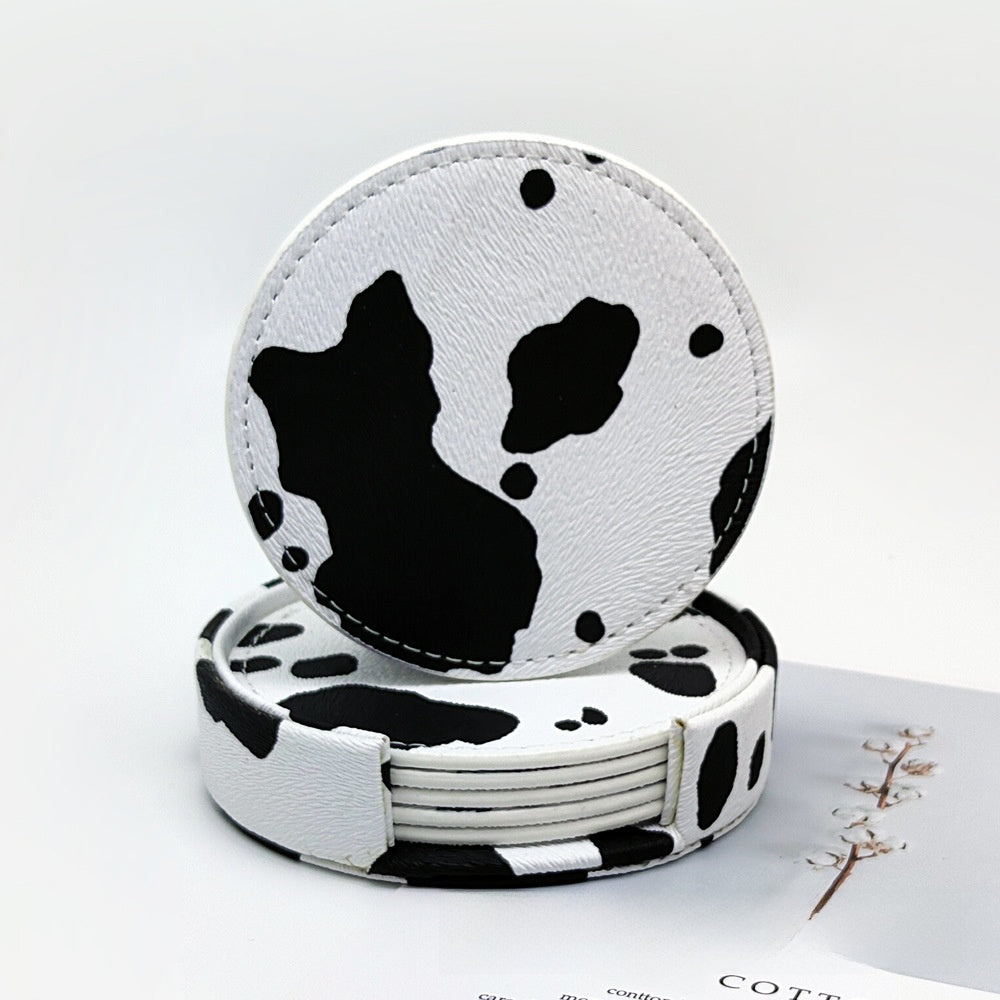 Black and white cow print PU leather round coaster set with a holder