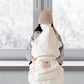 Quilted baby cape laid flat showing its full cape and blanket shape