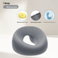 Gray memory foam face rest pillow shown with a cutaway of the yellow memory foam core and a zippered detachable jacket