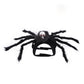 Spider back pet costume with hook and loop chest strap and a red eyed skull on a plain background