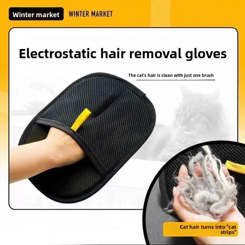 Angled view of the fur removal mitt on a hand ready to lift shed fur