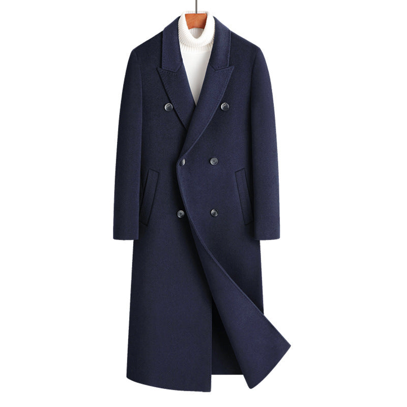 Navy double breasted long coat on a wooden hanger, a shade shown in the gallery but not offered as an option