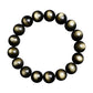Black obsidian bead bracelet with warm gold sheen band across each bead