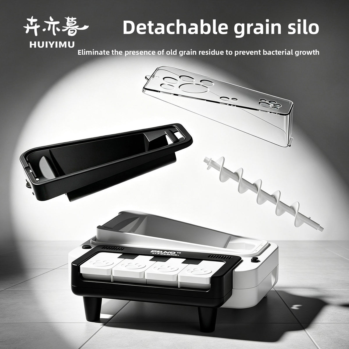 Piano treat toy parts: transparent lid, black silo and white spiral above the assembled piano base