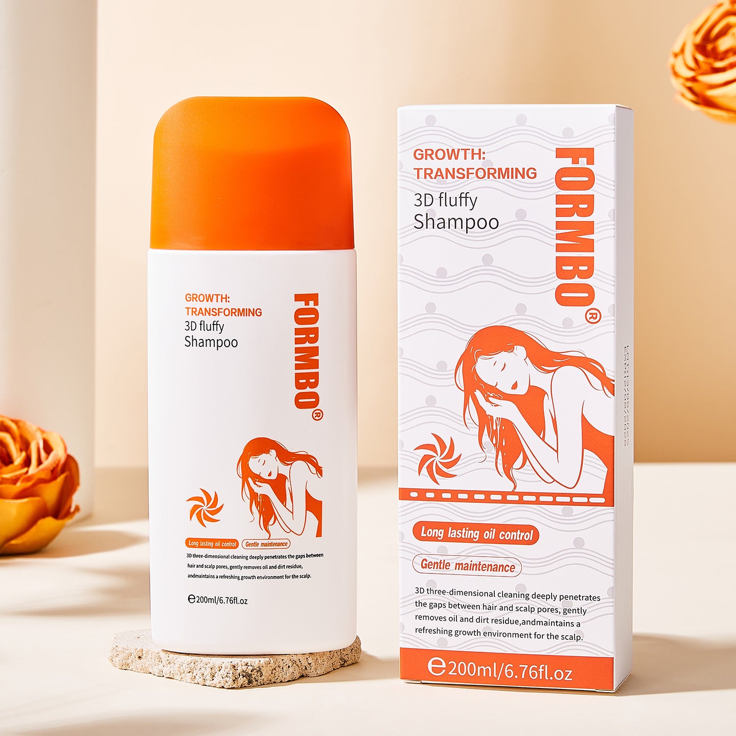 Shampoo bottle and carton styled with dried orange roses on a soft cream surface