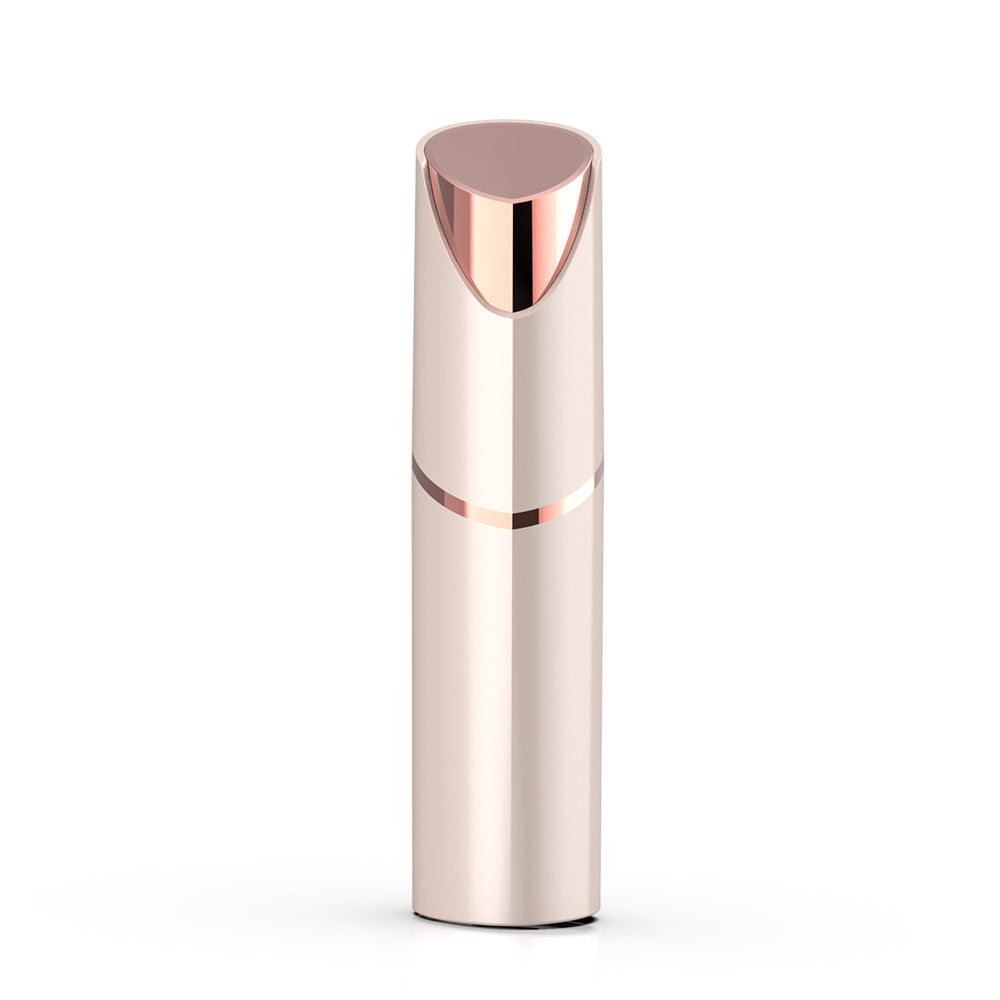 Champagne gold foil facial hair remover with rose gold tip standing capped