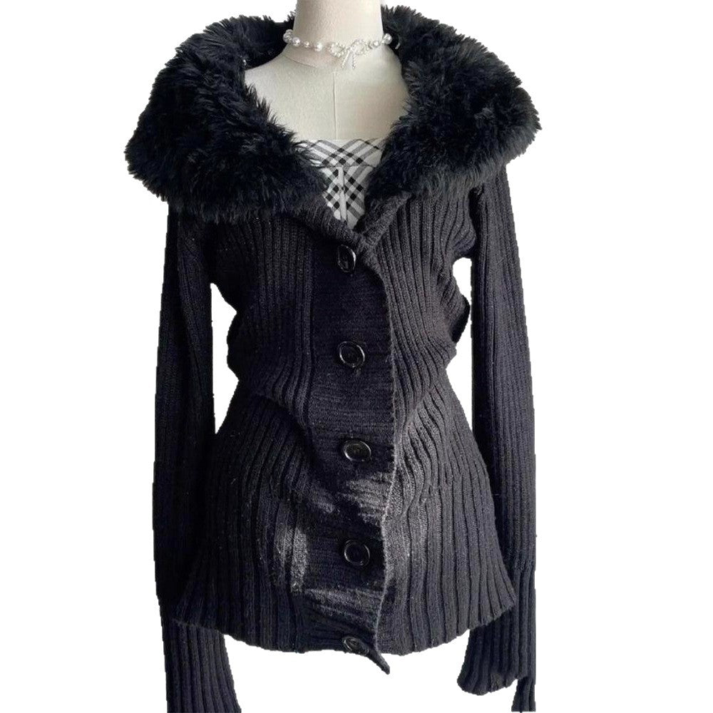 Black ribbed knit cardigan with plush collar on a mannequin against a plain white background