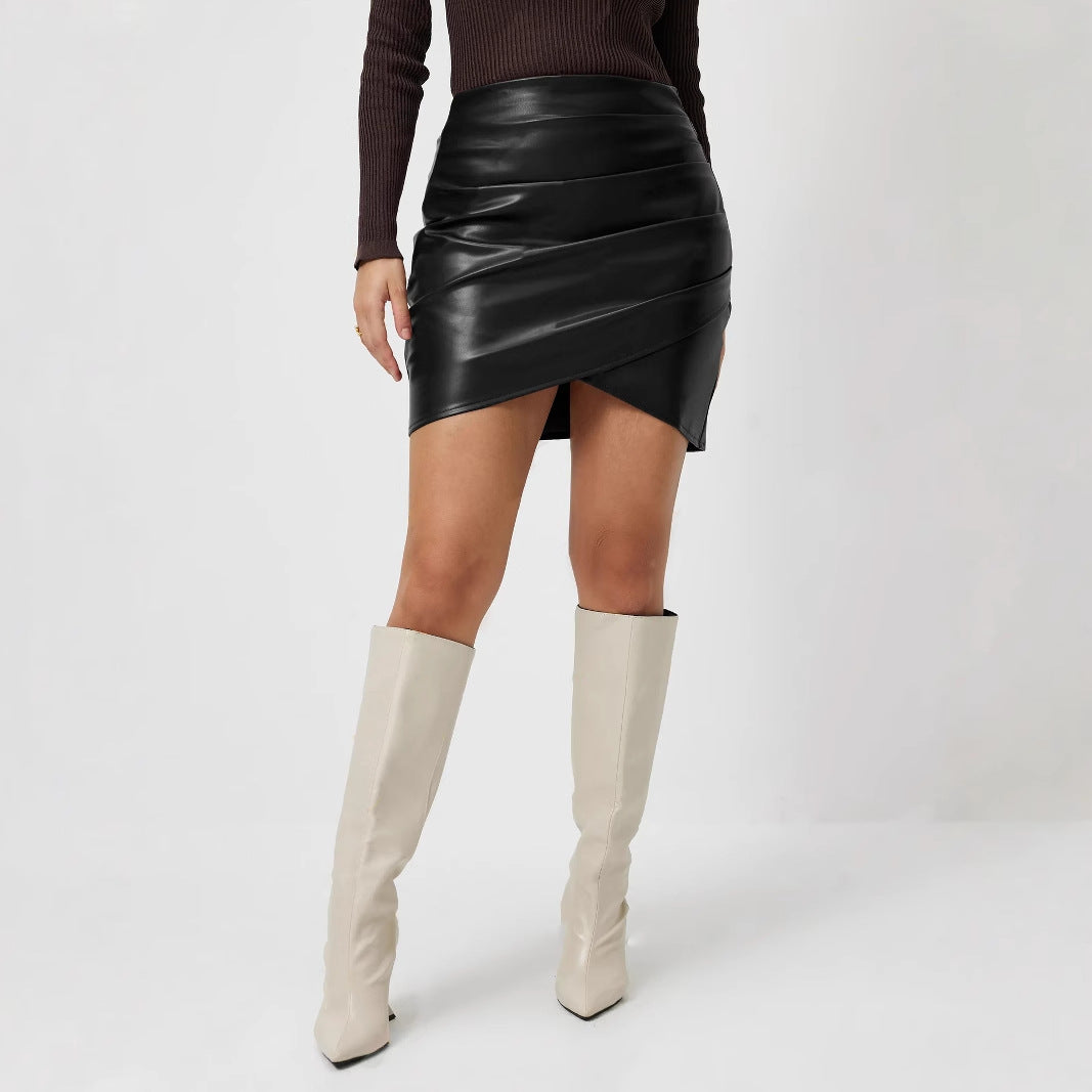 Brown short-sleeve draped women's top styled in a lifestyle setting
