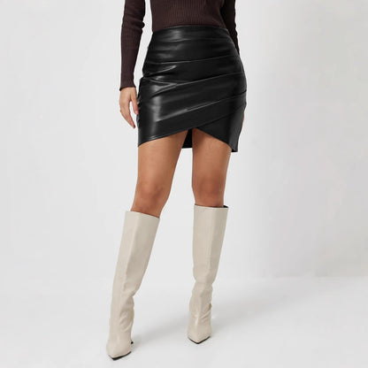 Brown short-sleeve draped women's top styled in a lifestyle setting