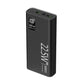Black power bank marked 22.5W showing the port row and power button on top