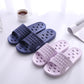 Pair of EVA bath slippers placed by the bathroom door ready to wear