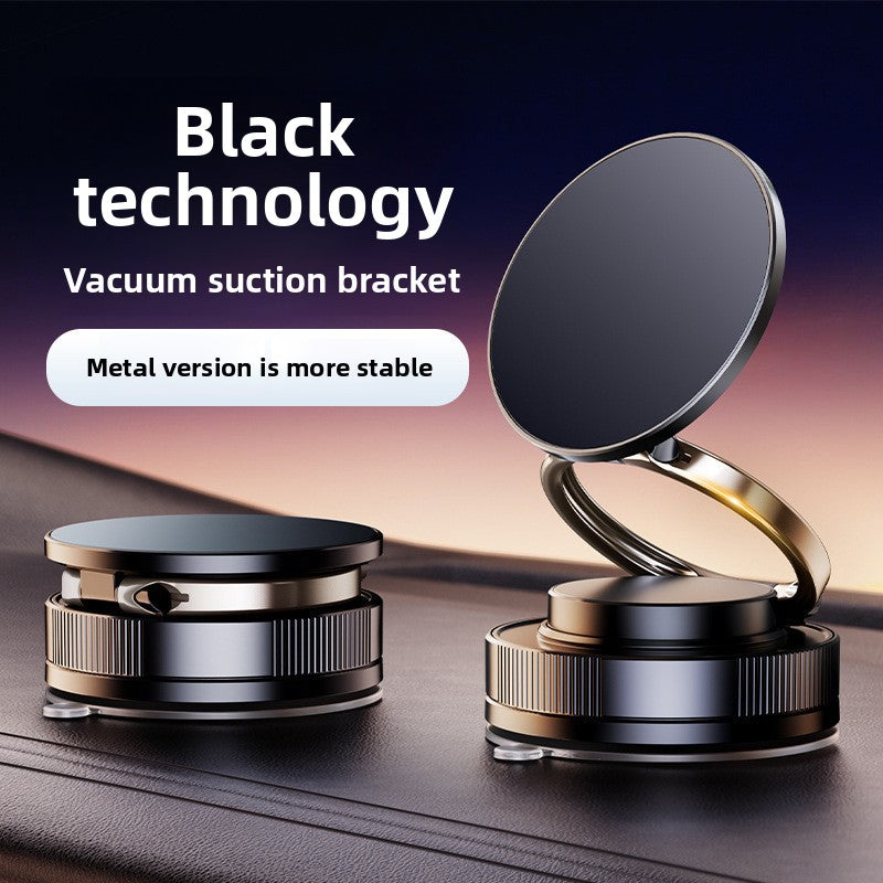 Black magnetic car phone holder with a round pad and knurled vacuum suction base on a dashboard