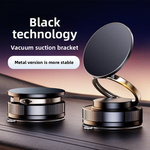 Black magnetic car phone holder with a round pad and knurled vacuum suction base on a dashboard