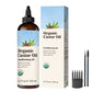 Rosemary hair oil bottle with pointed tip beside its dark blue box and two spoolie applicator brushes